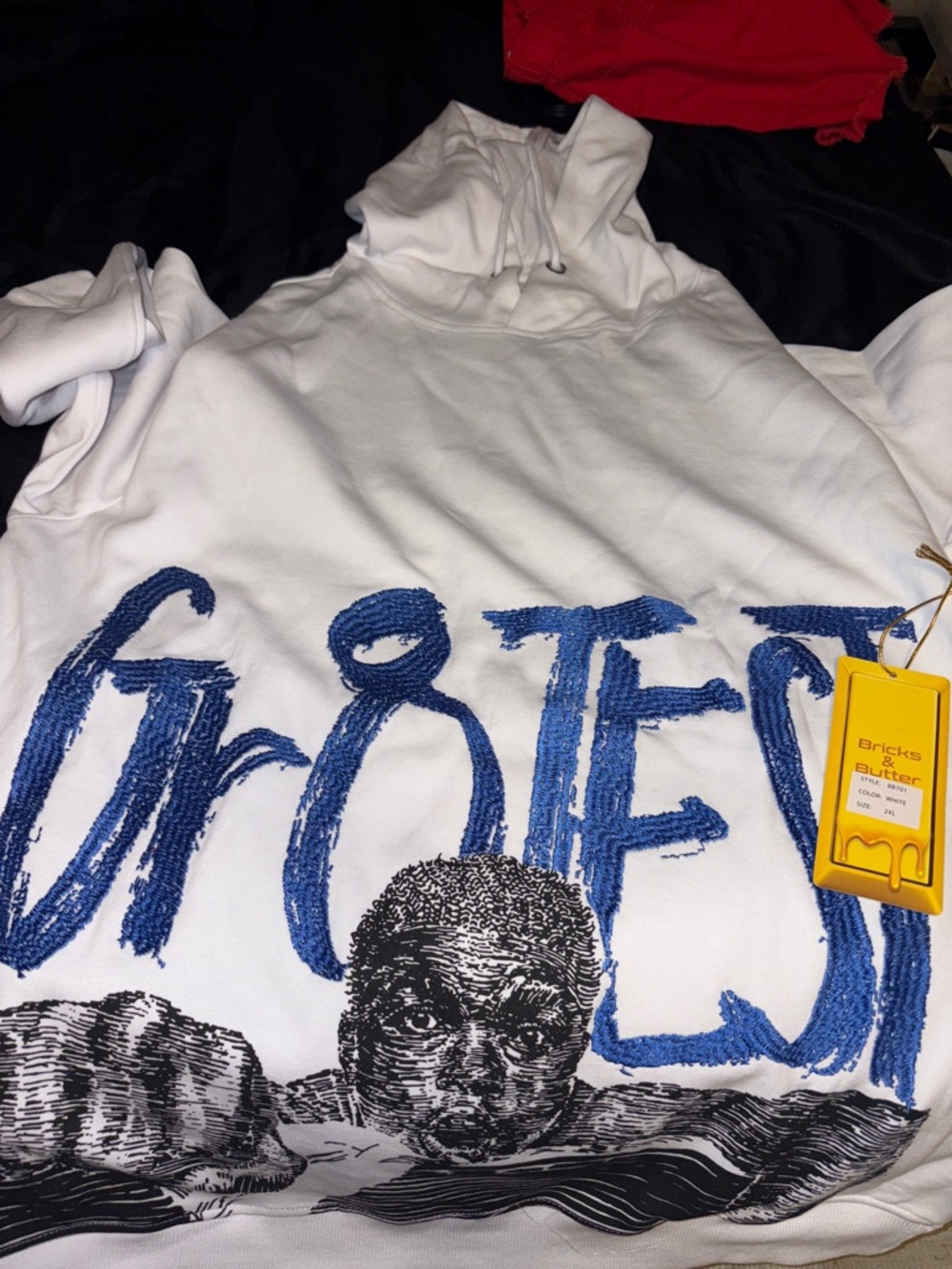 White Graphic Hoodie with Blue Script and Black Illustration